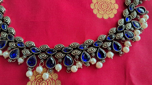 Royal Blue Oxidised Silver Necklace and Earrings Set with Pearl Accents | Desi Kalakari Fashion Studio